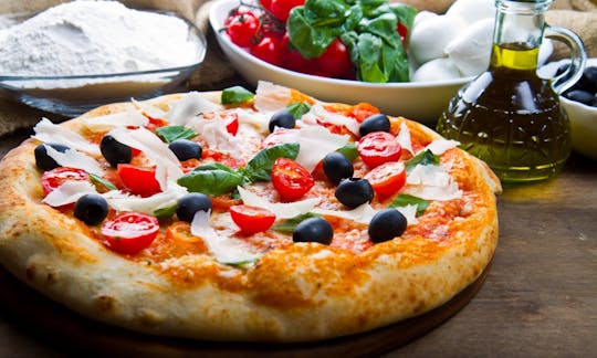Rome Gastronomique: cours de préparation de Pizza, dégustation d'un apéritif italien et de tiramisu