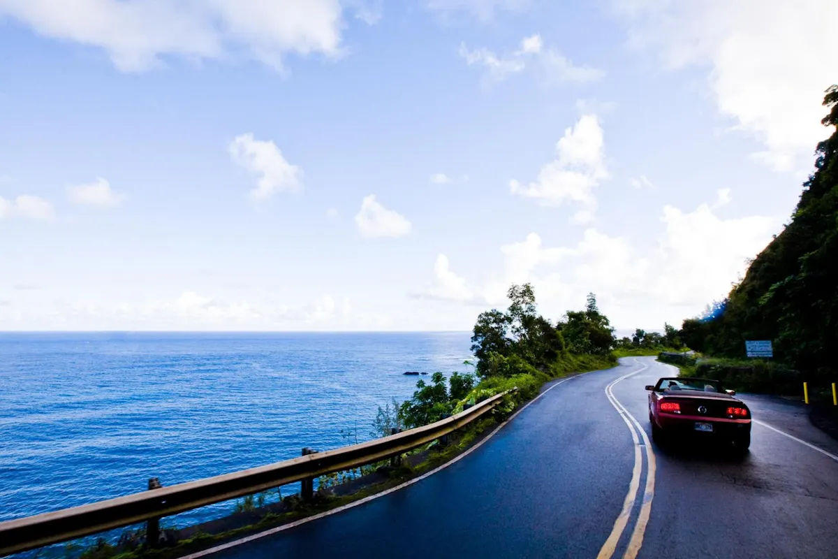 Maui Hana tour road and car.jpg