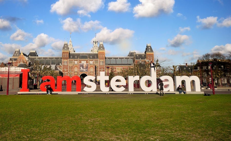 Tour da cidade de Amsterdã de ônibus com um guia ao vivo