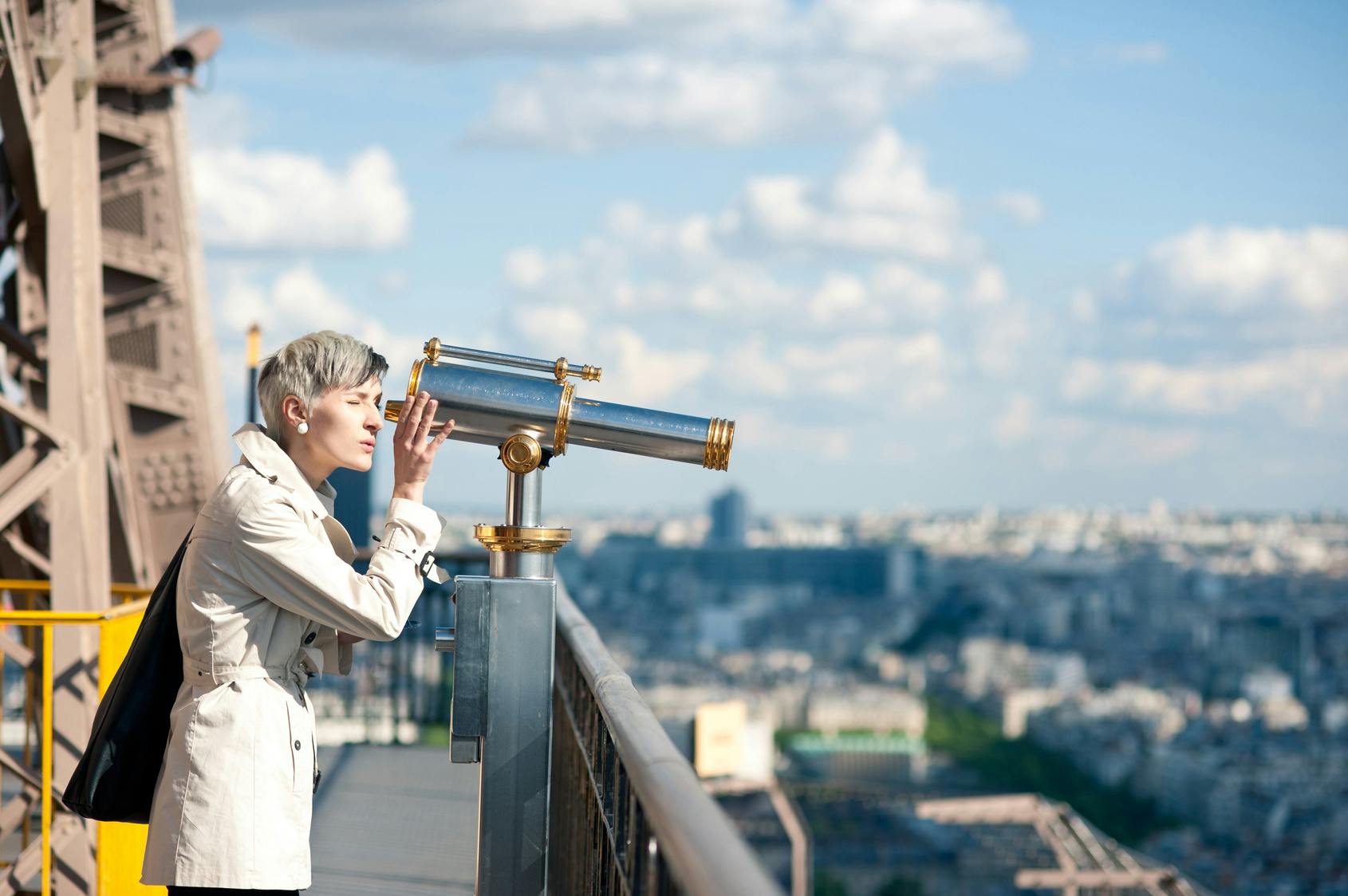 Visit to the top of the Eiffel Tower, City Tour and Seine Cruise