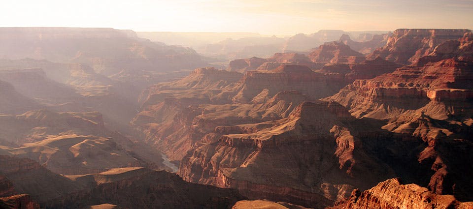 Tour en avion Grand Discovery avec tour Hummer au coucher du soleil dans le Grand Canyon