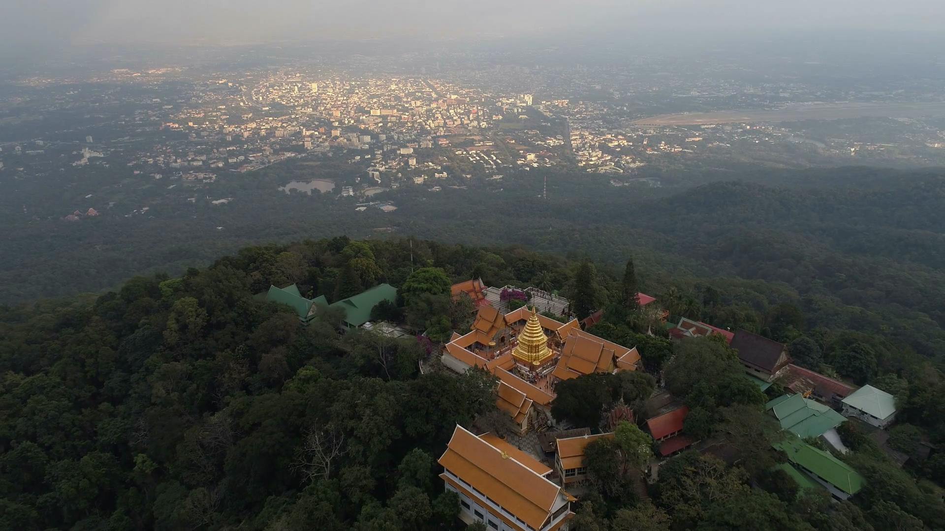 videoblocks-aerial-scene-of-zoom-out-from-temple-on-the-mountain-doi-suthep-chiang-mai-chaing-mai-thailand-4k-video_r3ml5-so7m_thumbnail-full01.png
