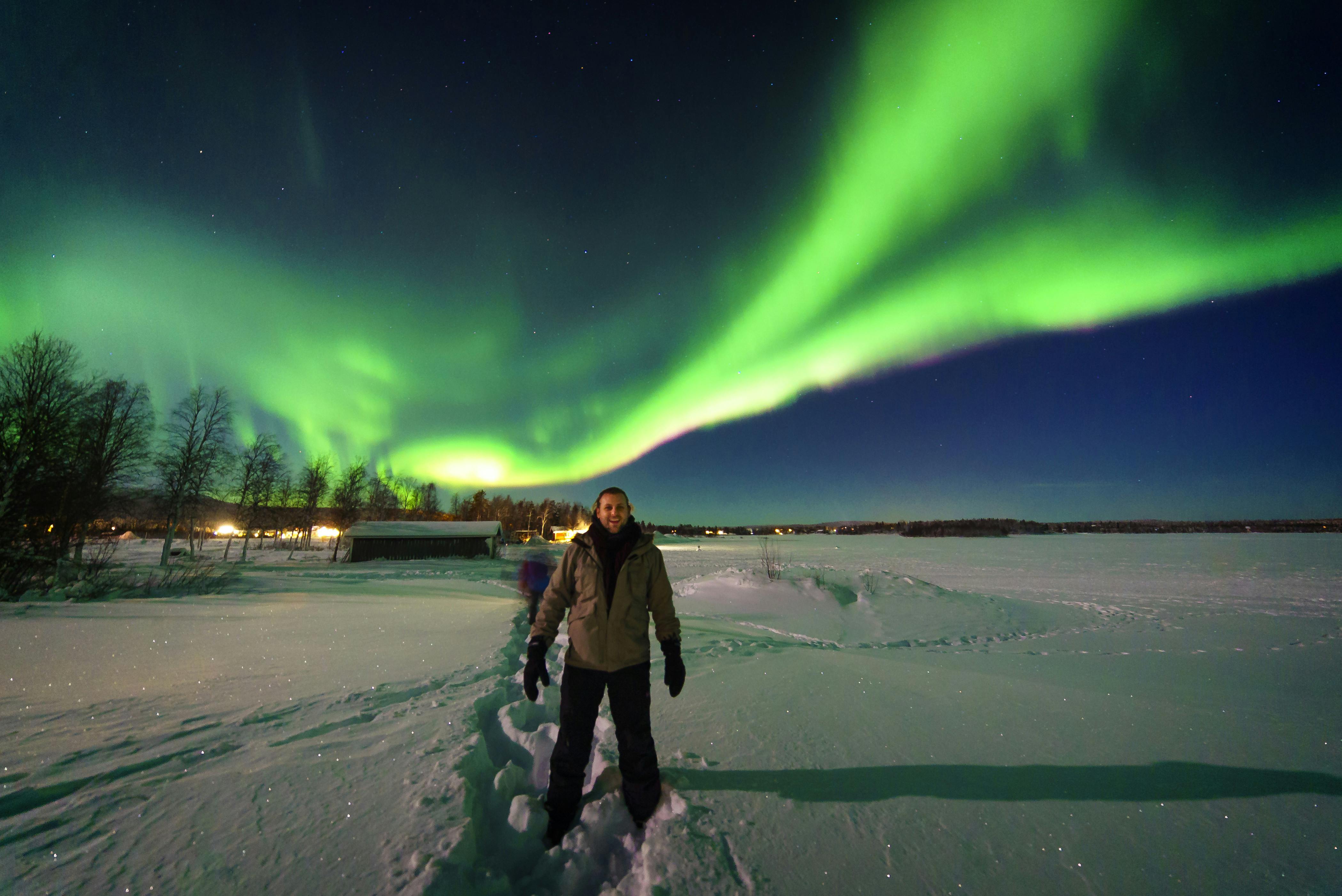 Passeio de snowmobile para ver a aurora boreal