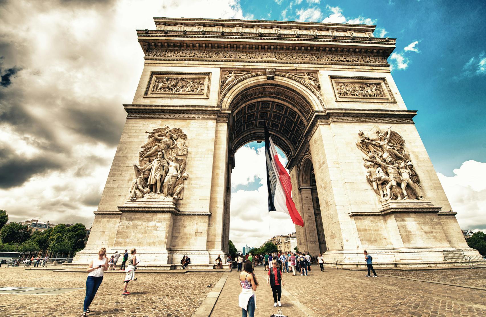 Arc de Triomphe in Paris. Etoile roundabout on a beautiful summe.jpg