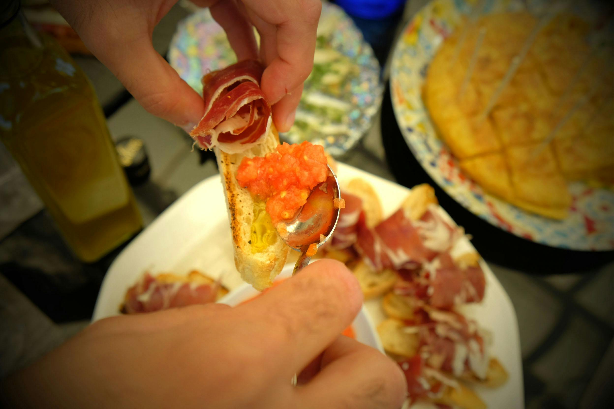 Tapas and Paella cooking class on a luxury rooftop in Madrid