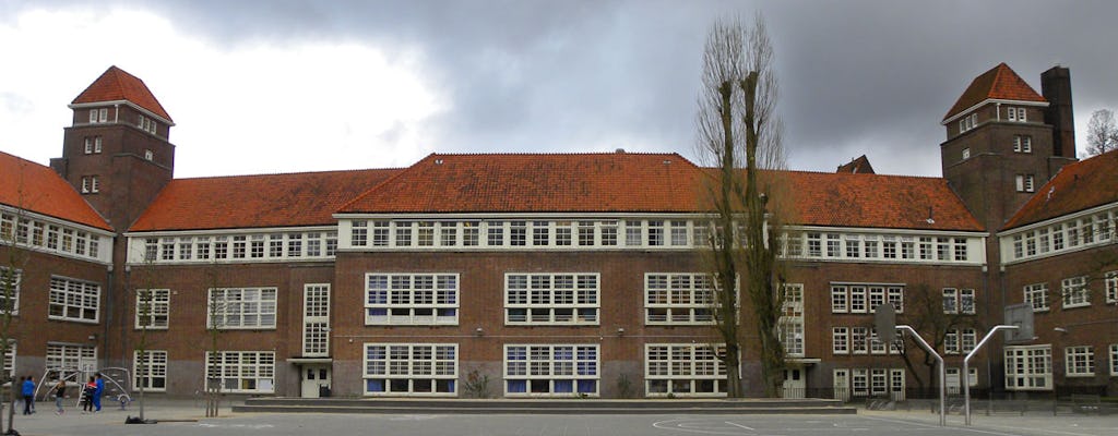 Tour privato di 2 ore dell'architettura della scuola di Amsterdam