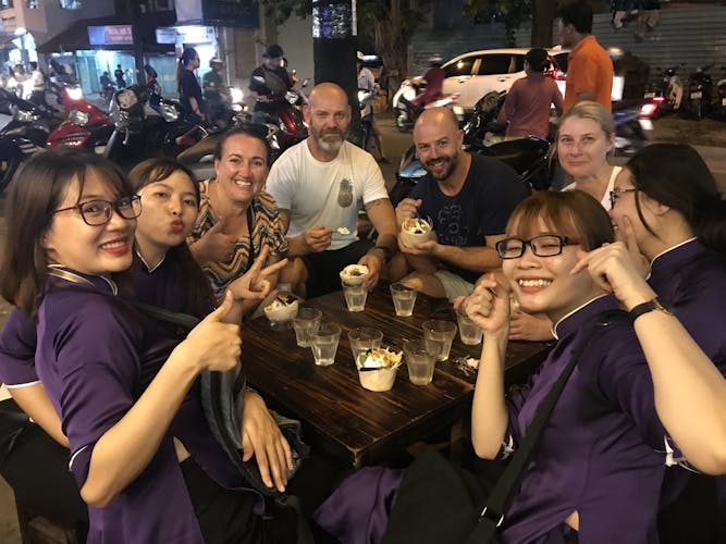 Ho Chi Minh City scooter food tour by night with a local host