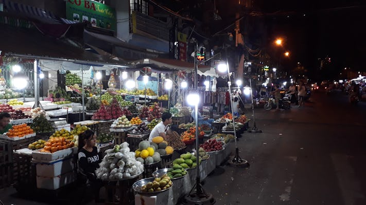 Walking market food tour by night in Ho Chi Minh city