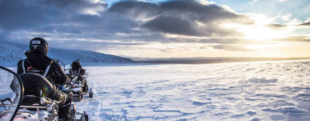Explore the golden circle and an ice cave with snowmobiling trip