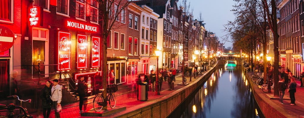 Wycieczka piesza z audioprzewodnikiem w aplikacji mobilnej po Dzielnicy Czerwonych Latarni w Amsterdamie