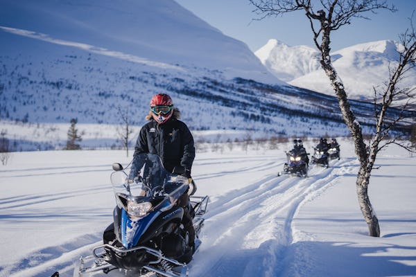 Wilderness snowmobiling and ice domes visit