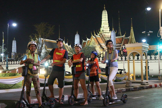 Guided e-scooter night tour with local street food