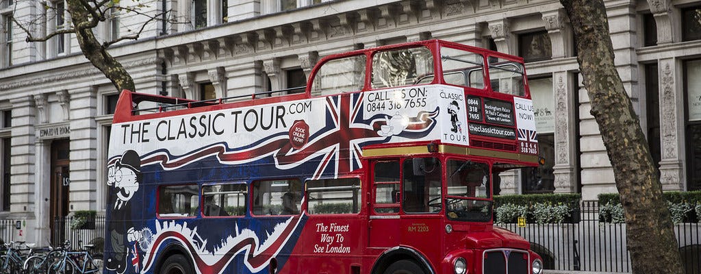 Classic London sightseeing tour in a vintage bus