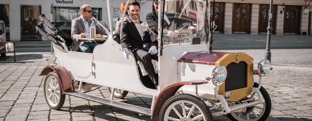 Viena turismo brillante en un coche eléctrico clásico