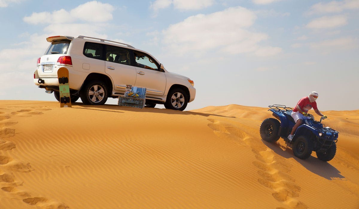 Desert safari with private beach and pool access in Palm Jumeirah