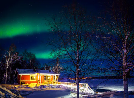 Aurora Borealis safari by snowmobiles