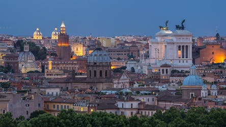 Car tour of Rome at twilight