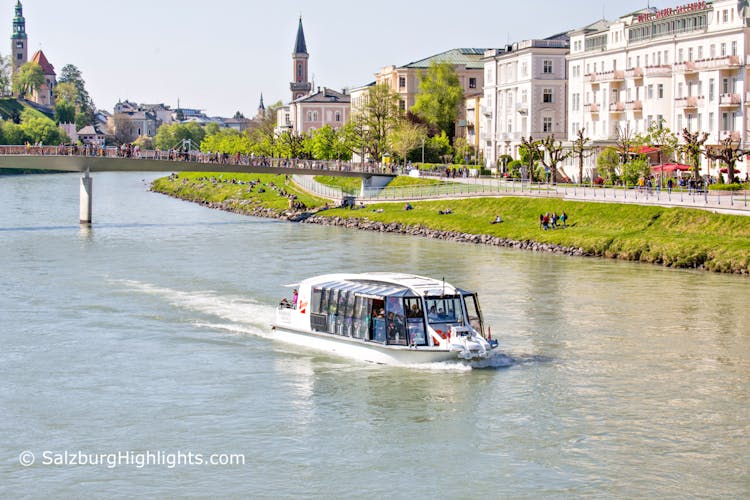 Boat trip to Hellbrunn Palace with trick fountain and London double-decker bus