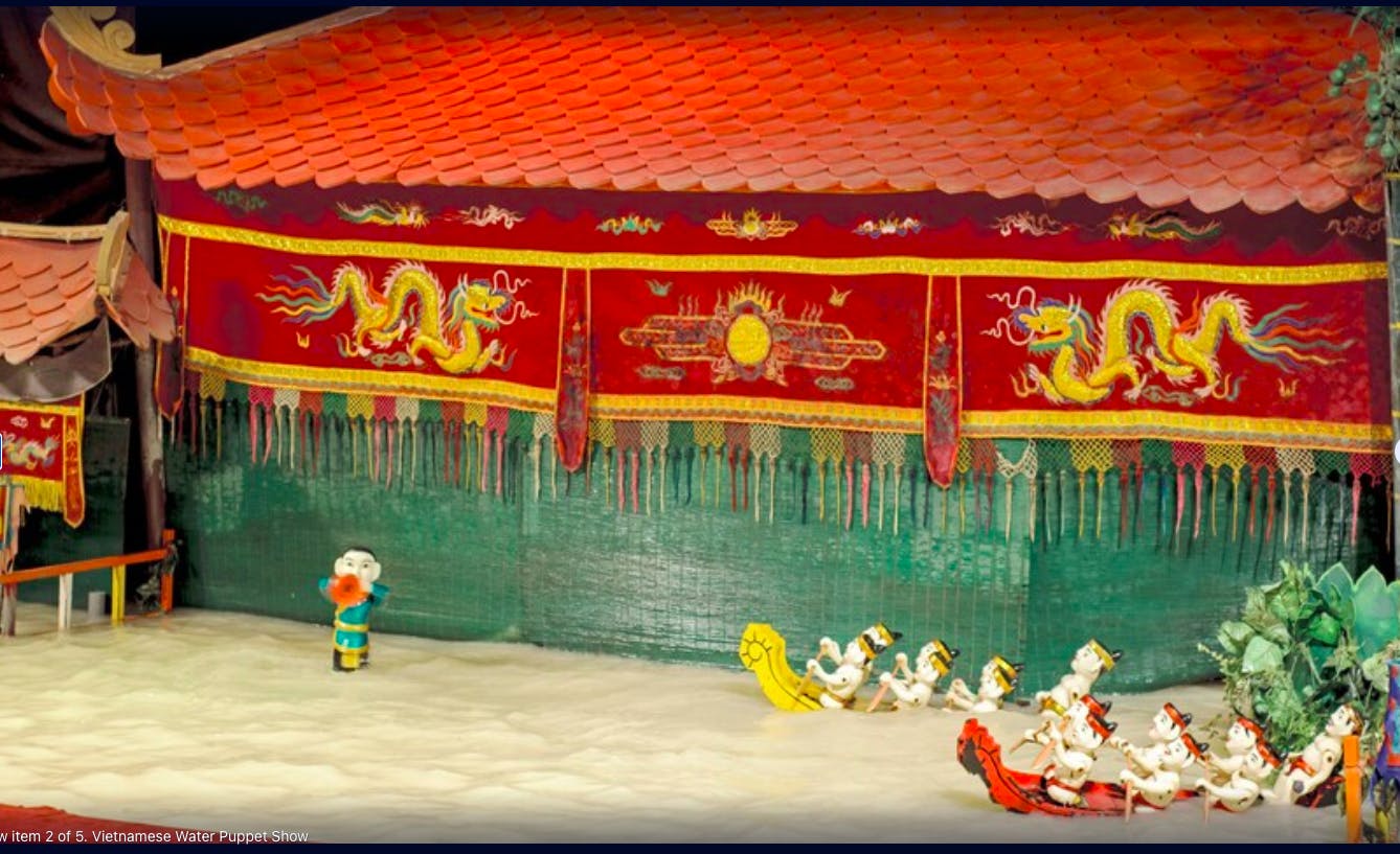 Espectáculo nocturno de marionetas acuáticas vietnamitas con cena