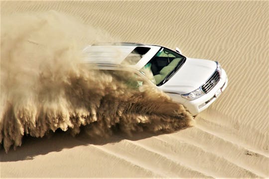 Desert private guided safari dune bashing, sandboarding and more