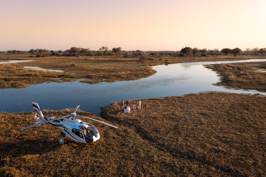 Okavango Delta private helicopter tour with gin & tonic bush stop