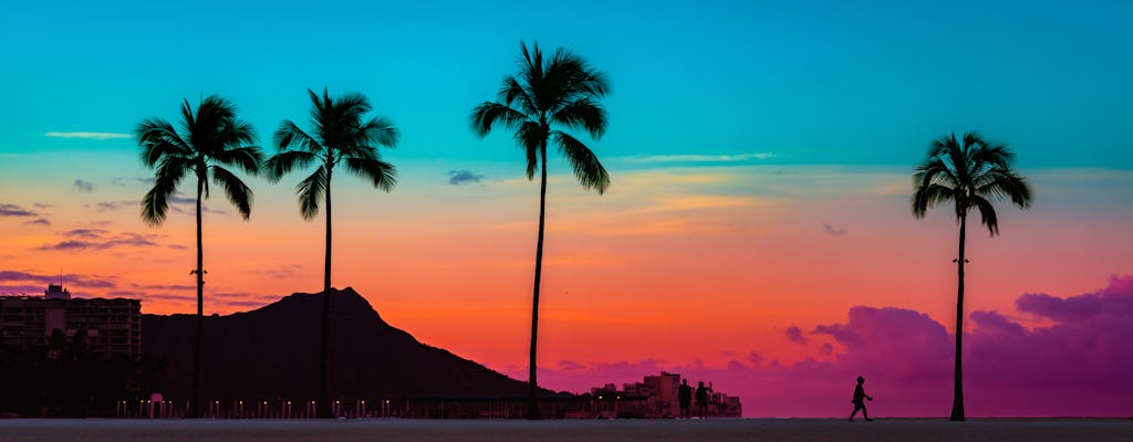 Crucero en barco con fondo de cristal al atardecer de Waikiki