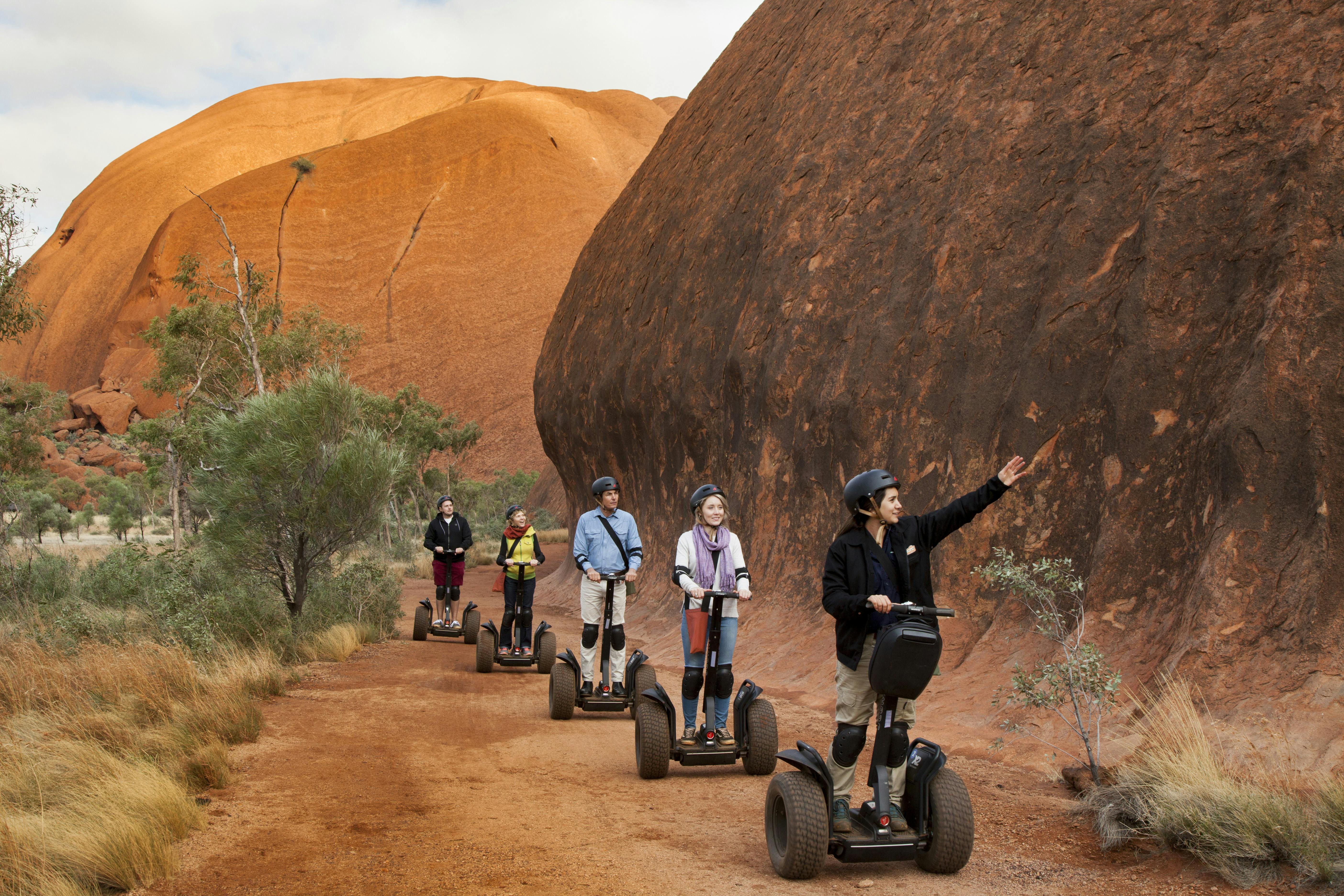 Uluru sunrise and self-balancing scooter
