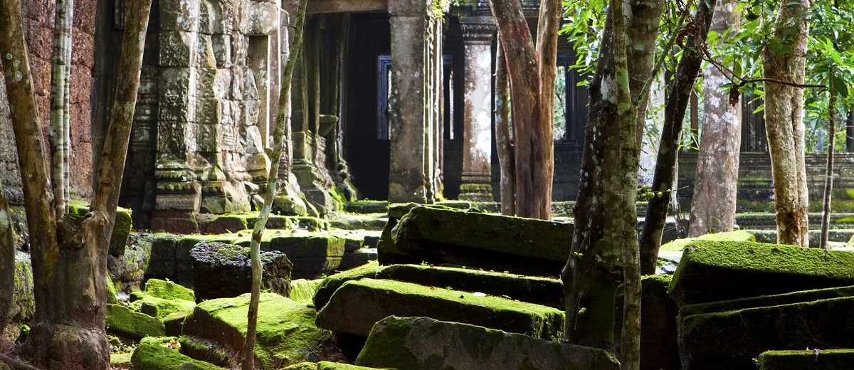 Moss-covered jungle temple ruins at Beng Mealea near Siem Reap, Cambodia