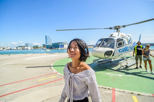 Visite de Barcelone à 360° en hélicoptère, à pied et en bateau