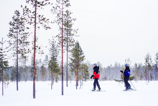 Ivalo snowshoeing and ice fishing combo tour