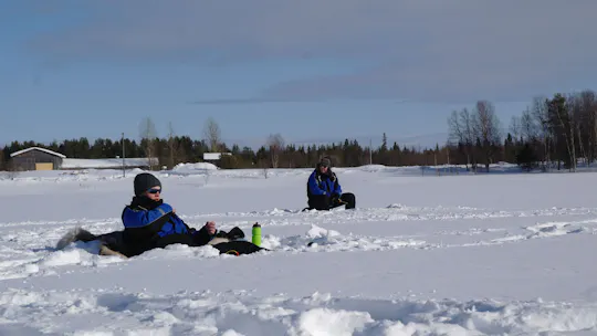 Ice fishing trip from Levi to Kivijärvi by snowmobile