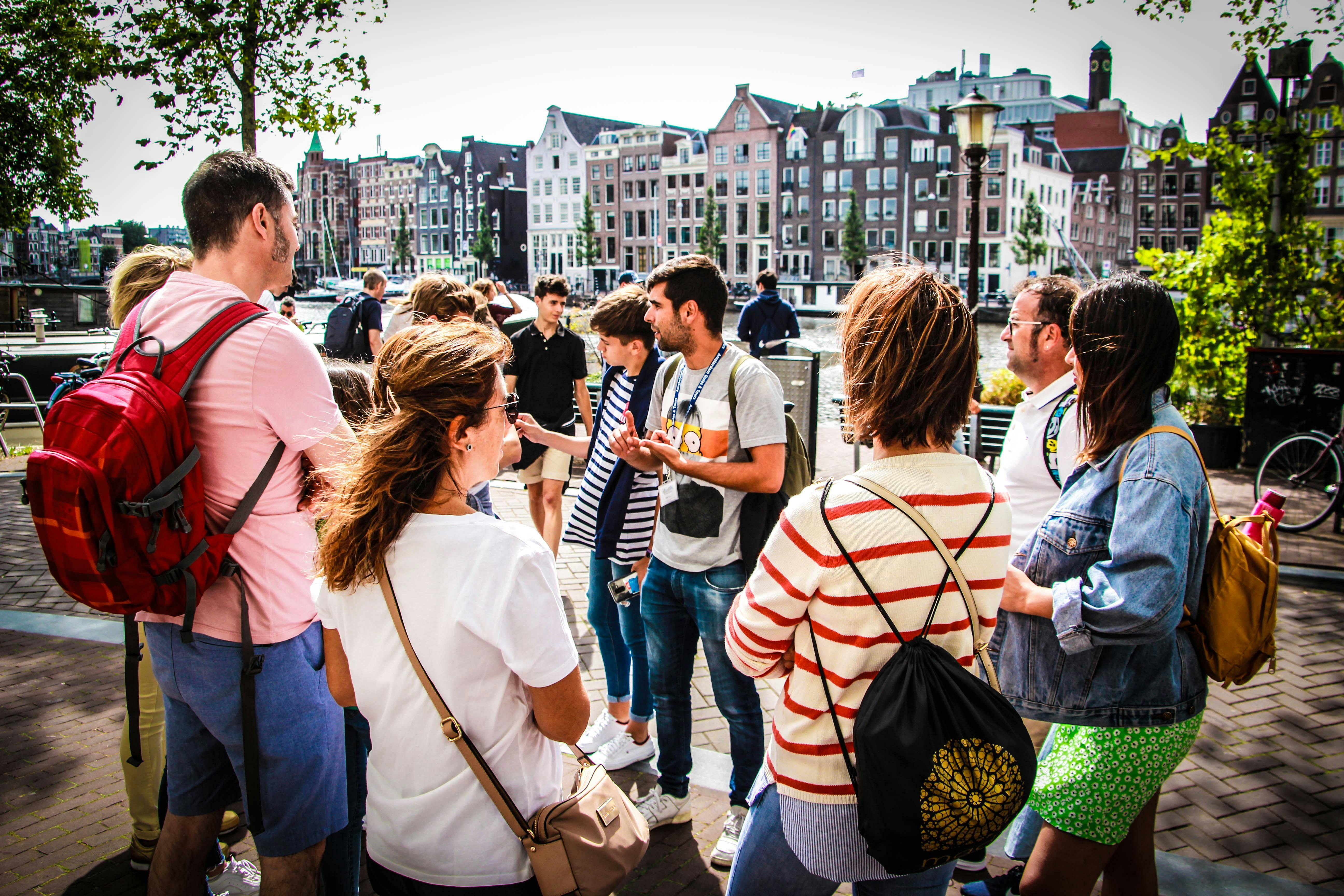 Tour combinato di un'intera giornata ad Amsterdam a piedi, in bicicletta e in bar