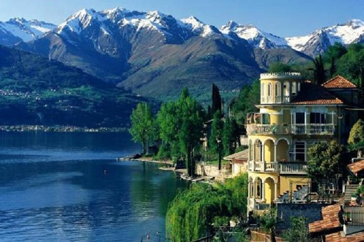 Varenna, Bellagio and Lugano private Como lake cruise from Milan