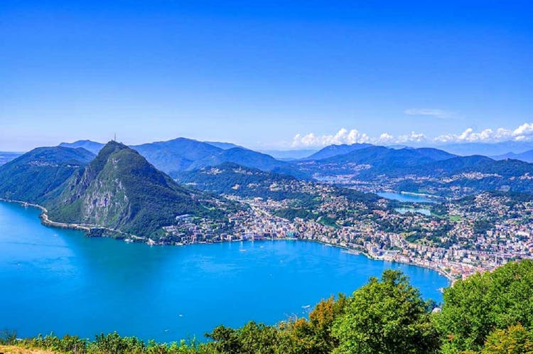 Varenna, Bellagio and Lugano private Como lake cruise from Milan