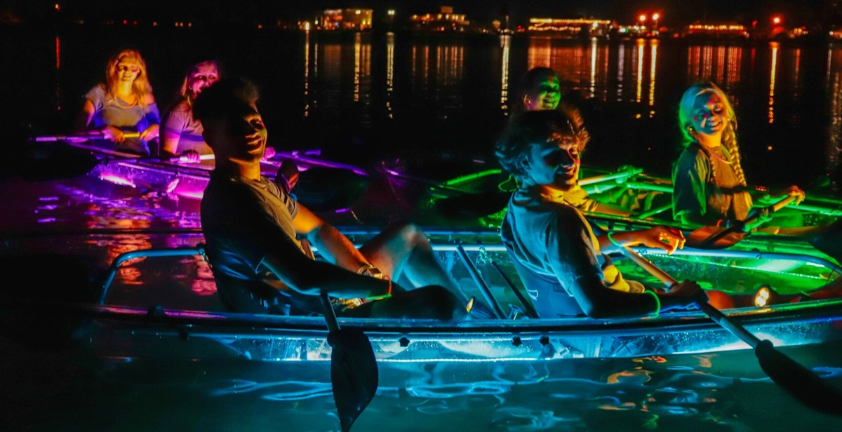 Night time glow paddle at Margaritaville Pensacola Beach musement