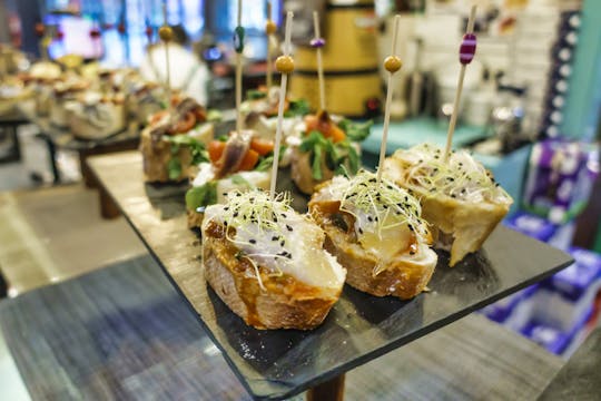 Barcelona walking food tour with 3 local gourmet bars