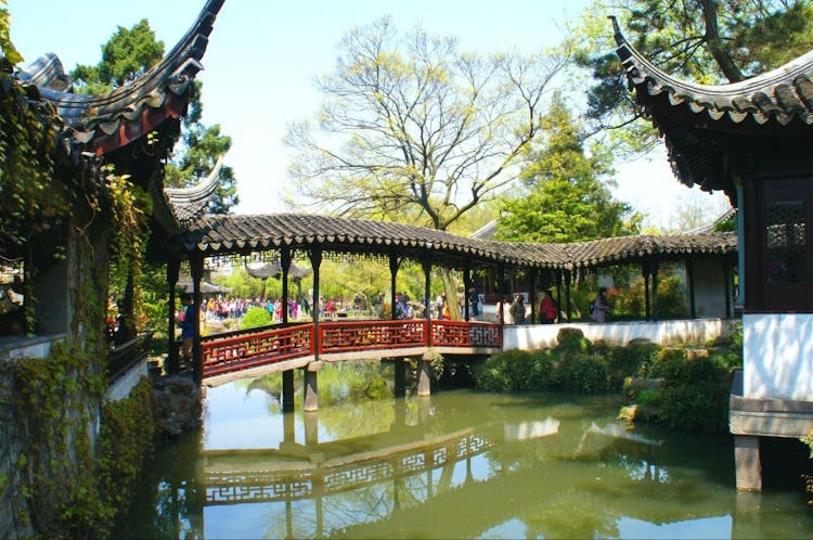 Private trip to Suzhou Gardens and Old Street with hotel ortrain station transfer