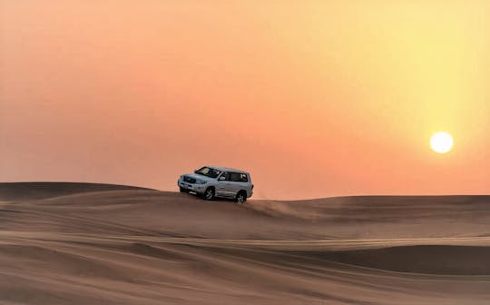 Sunset desert camel ride, inland sea visit, and dune bashing