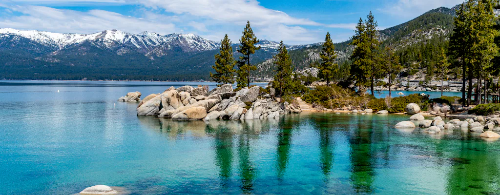 Lake Tahoe shoreline and mountains (image from Musement)