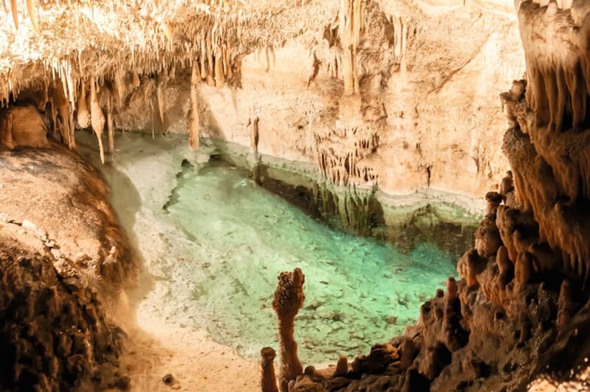 Drach Caves, Pearl Factory and Local Market Tour