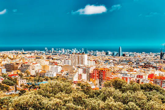 Audio-guided walking tour of Barcelona with Montjuic cable car voucher