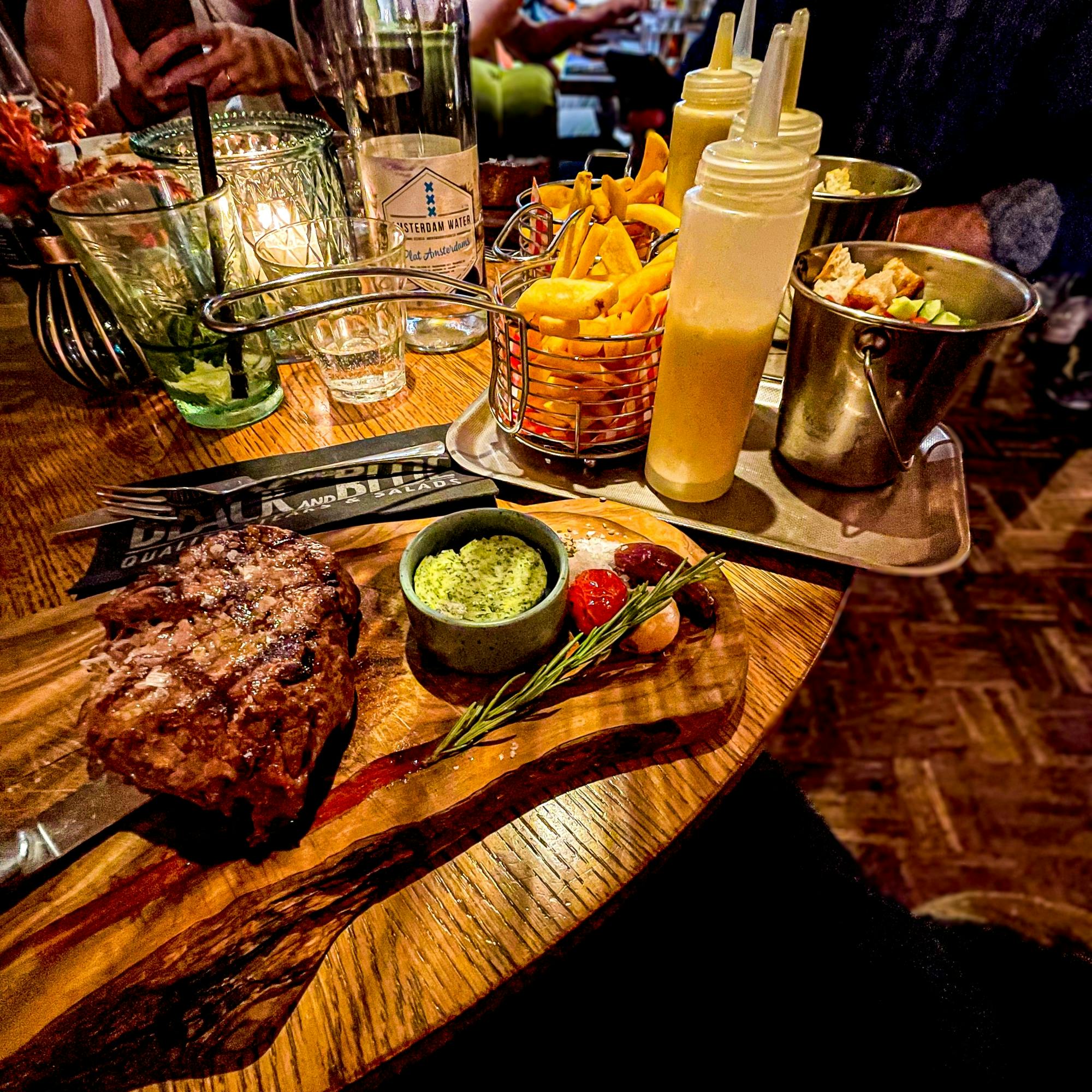 Amsterdam nightlife tickets with dinner at Black and Blue