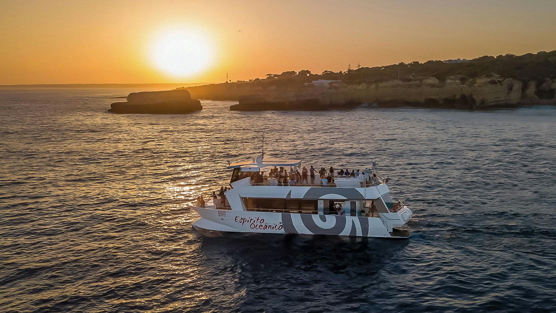 Sunset guided boat trip with secluded beach BBQ from Albufeira