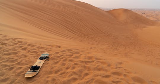 Sandboarding and secret paradise valley full-day tour with pickup