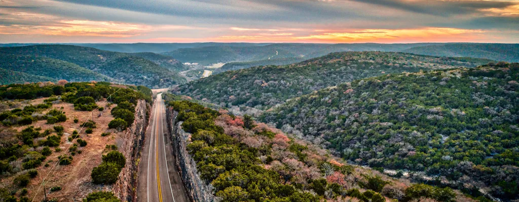 Scenic Texas Hill Country road on a sightseeing tour from Austin