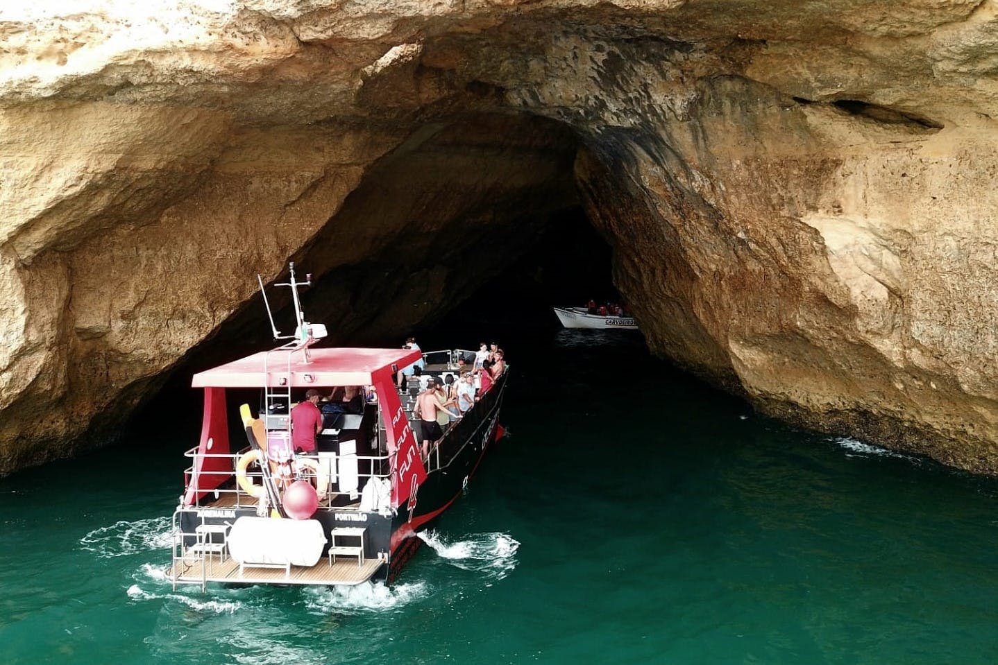 Family catamaran tour to Benagil Caves from Portimão