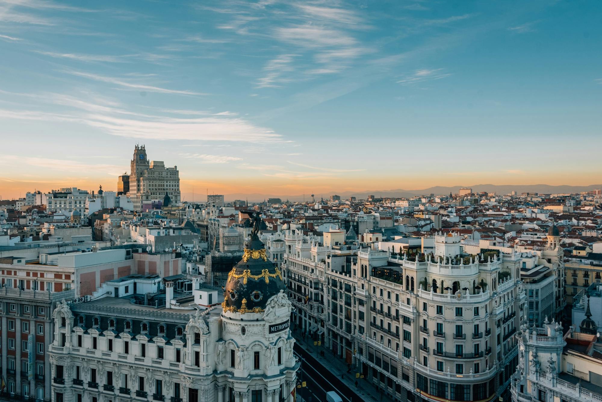 Walking tour of Madrid city center at sunset