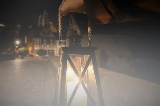 Night watchman tour with torch through Siegburg