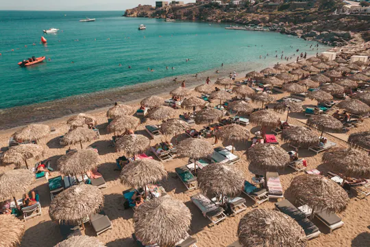 Middle rows seaside sunbed rental in Super Paradise Beach Mykonos