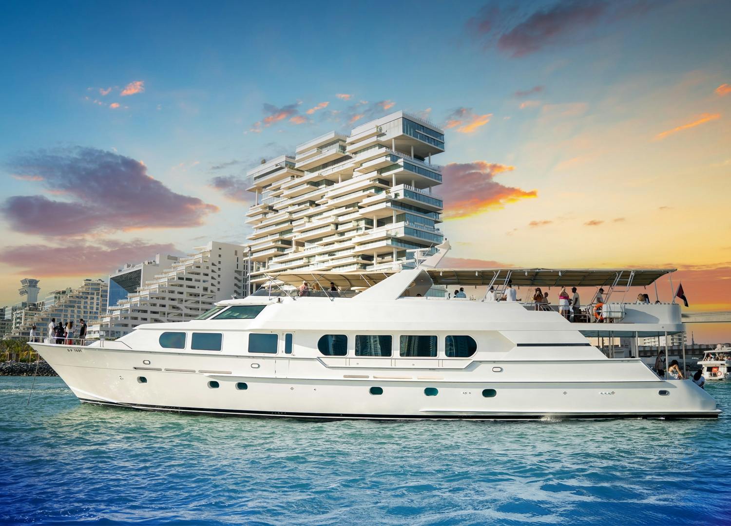 Dubai Sunset yacht party with live DJ, snacks, and drinks